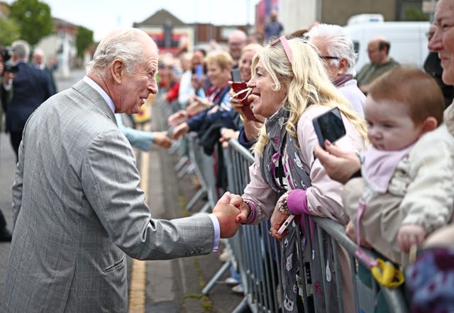 The King meets wellwishers outside The Warehouse