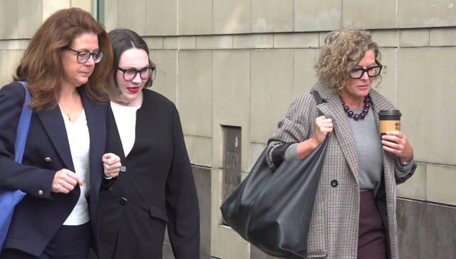 Fiona Donohoe (right) arrives at Belfast Coroner's Court