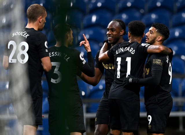 Michail Antonio (centre right) celebrates for West Ham