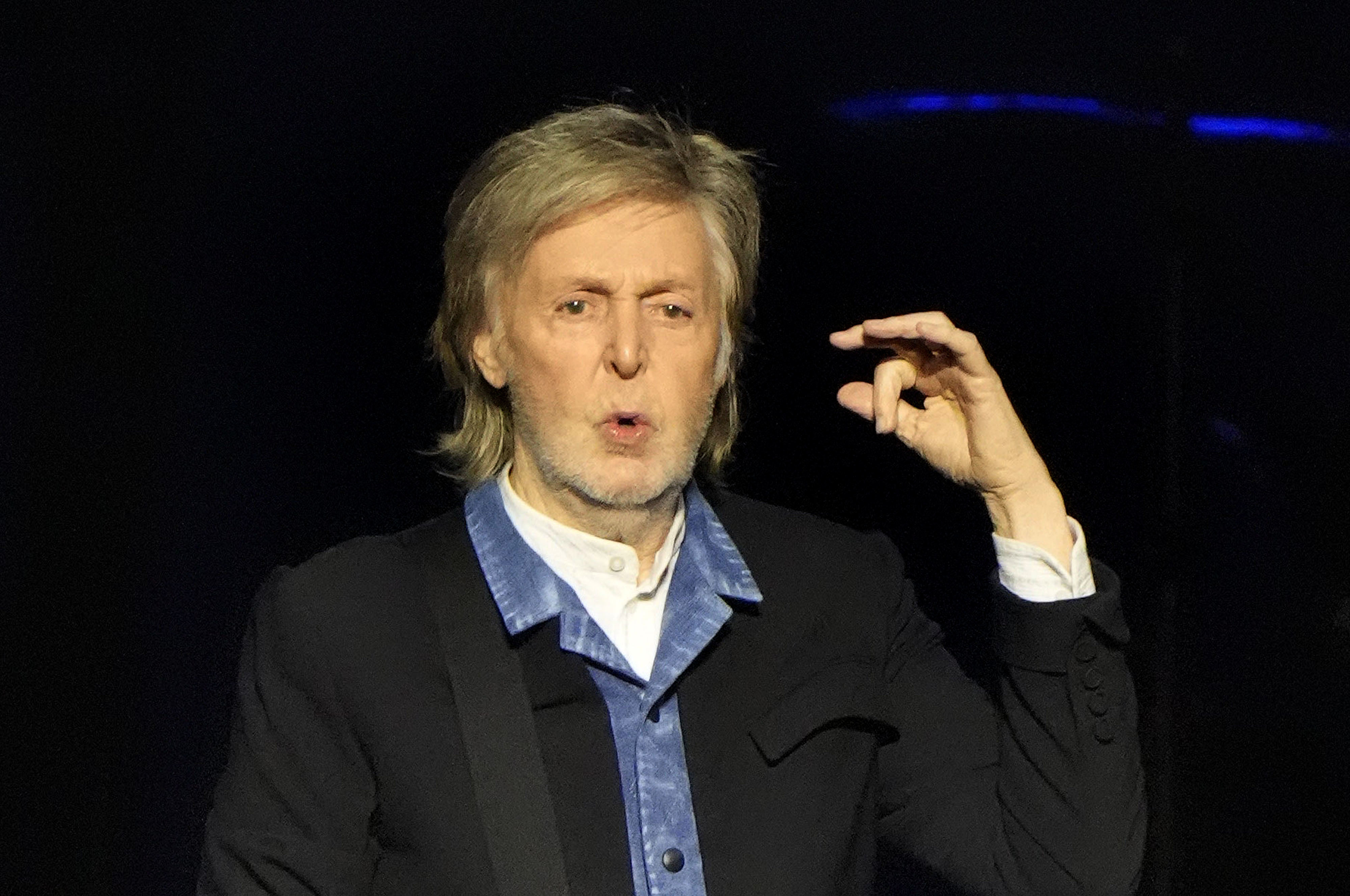 Sir Paul McCartney performing on stage at Co-op Live in Manchester during his Got Back tour in 2024
