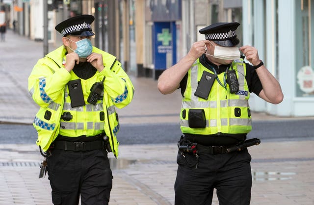 Police wearing masks