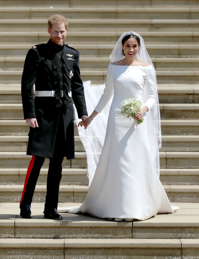 Prince Harry and Meghan Markle leave St George’s Chapel in Windsor Castle after their wedding.