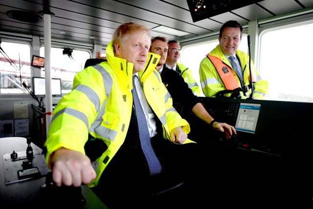 At the helm of a tug boat in the port of Bristol (
