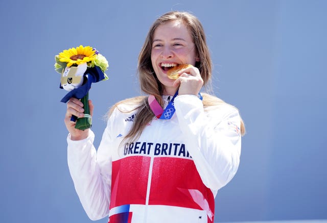 Charlotte Worthington celebrates her gold medal in the women's BMX freestyle