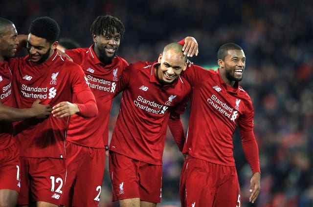 Liverpool's players celebrate the winner