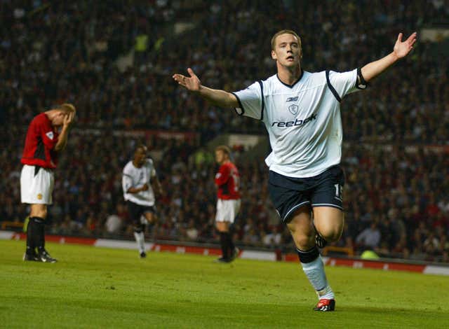Kevin Nolan celebrates after earning Bolton victory against United in September 2002
