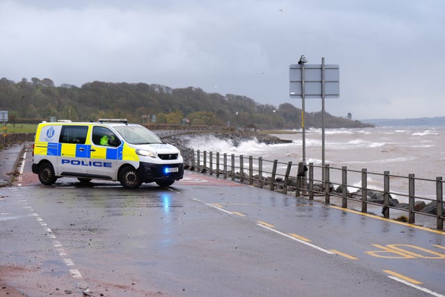 Police at the scene of a road closure on the A78 near Skelmorlie after Storm Boelo