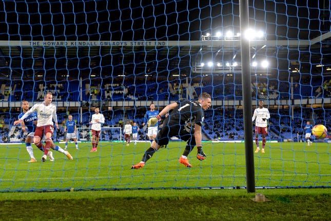 Arsenal’s Rob Holding (second left) deflects the ball into his own net to open the scoring