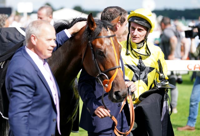 Clive Cox and Adam Kirby with Caturra at Doncaster
