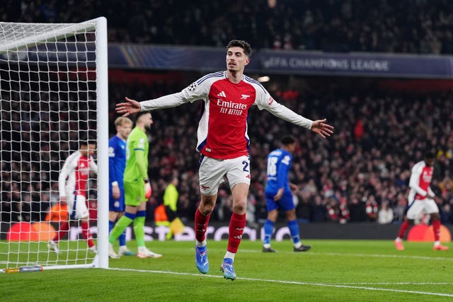 Kai Havertz holds both arms out to celebrate