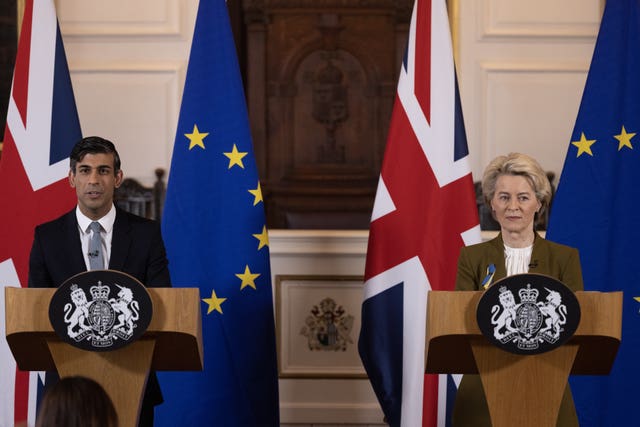 Rishi Sunak and Ursula von der Leyen stand behind lecterns as they talk to the media