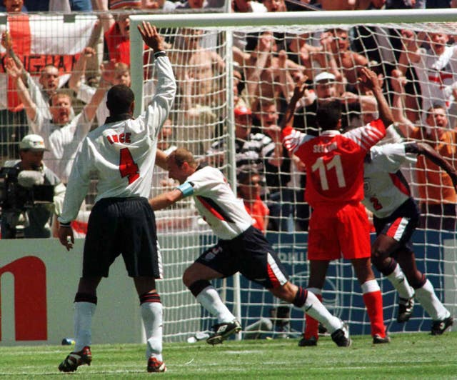 England captain Alan Shearer celebrates his goal against Tunisia
