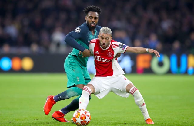 Hakim Ziyech competes with Tottenham's Danny Rose in the Champions League last season 