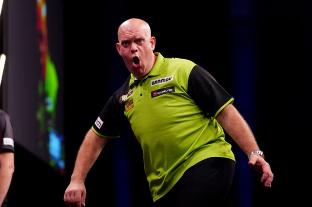 Michael van Gerwen celebrates winning a leg in the final during night 13 of the Pemier League in Birmingham