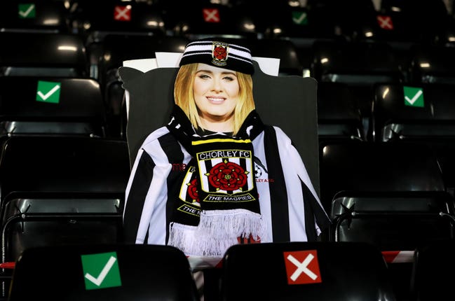 A cardboard cutout of Adele in the stands at Victory Park, Chorley