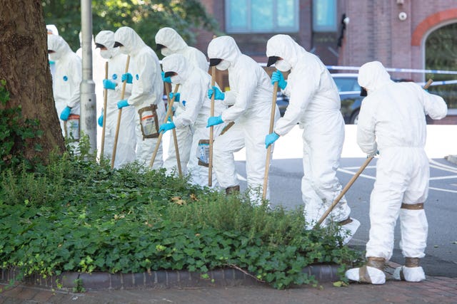 Police forensic officers carrying out a search near Forbury Gardens, in Reading town centre, after Khairi Saadallah launched a two-minute stabbing spree