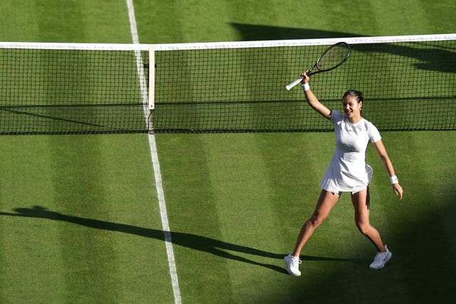 Emma Raducanu waves to Centre Court after her debut victory