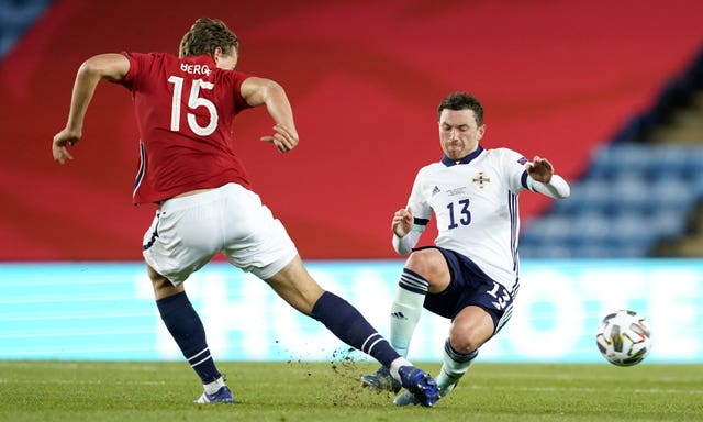 Corry Evans (right) finished with the captain's armband 