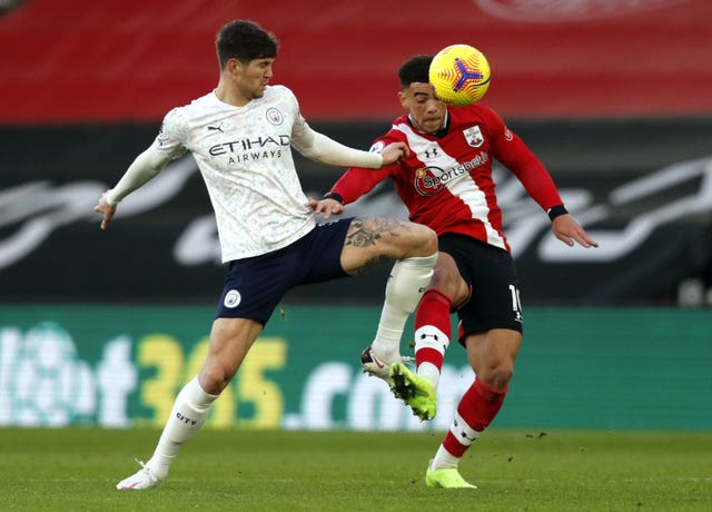 Manchester City's John Stones and Southampton's Che Adams (right) could come face-to-face at Wembley (
