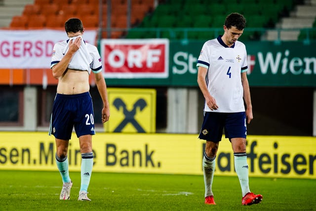 Northern Ireland’s Craig Cathcart (left) and Tom Flanagan reflect on another painful defeat