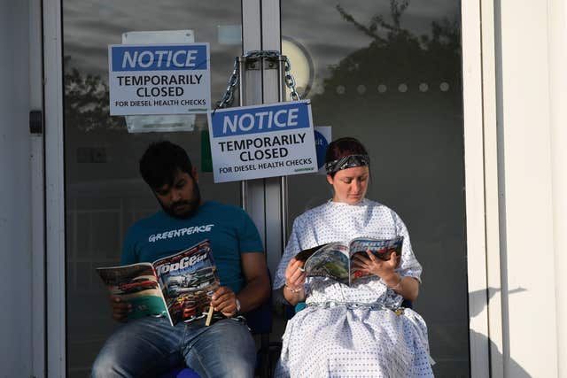 Volkswagen staff were unable to enter the building (Chris J Ratcliffe/Greenpeace/PA)