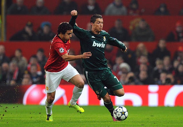 Ronaldo (right) returned to Old Trafford with Real Madrid in 2013 (Martin Rickett/PA).