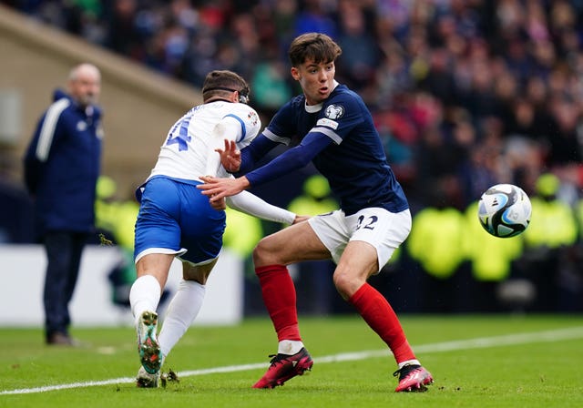 Scotland’s Aaron Hickey, right, has impressed