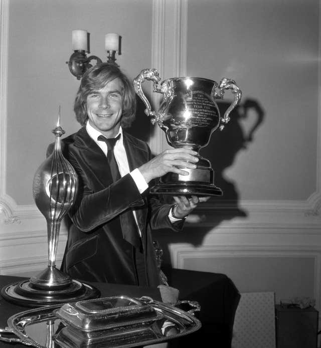 James Hunt celebrates after winning the 1976 Formula One title 