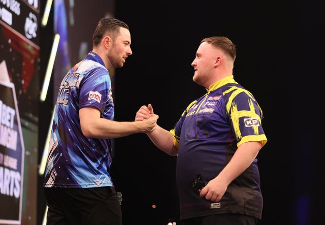 Luke Humphries and Luke Littler shake hands