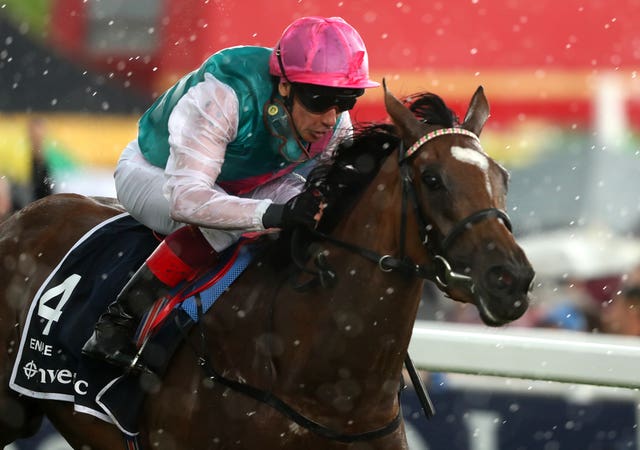 The driving rain does little to divert Enable from victory in the 2017 Epsom Oaks (Adam Davy/PA)