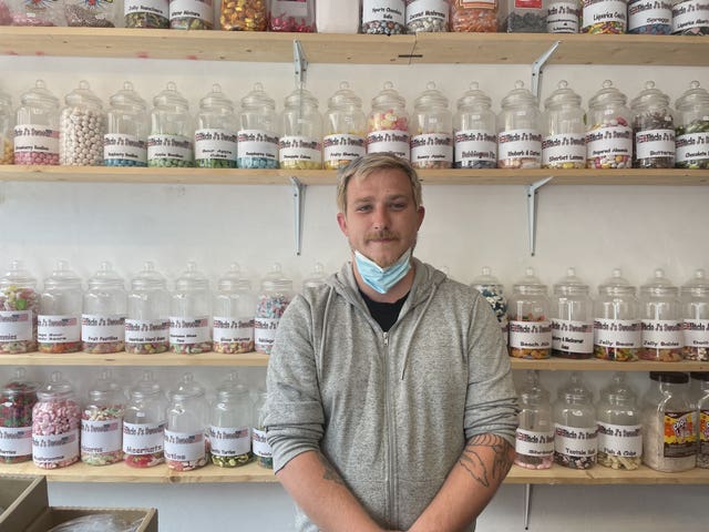 Clinton Matthews, owner of J's Sweets, inside his shop in St Ives during the G7 summit in Cornwall