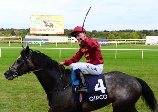 Oisin Murphy celebrates aboard Roaring Lion
