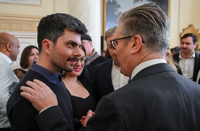 Keir Starmer speaks to men's mental health advisor Will Adolphy in 10 Downing Street