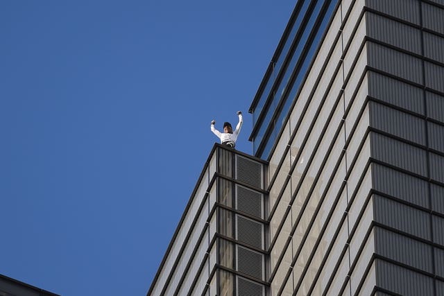 Alain Robert climbs Heron Tower