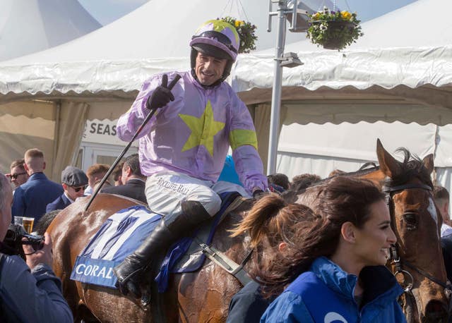 Takingrisks ridden by Sean Quinlan wins the Coral Scottish Grand National Handicap Chase during Coral Scottish Grand National Day at Ayr Racecourse