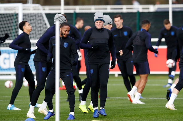 Wayne Rooney, centre, during an England training session at St George’s Park