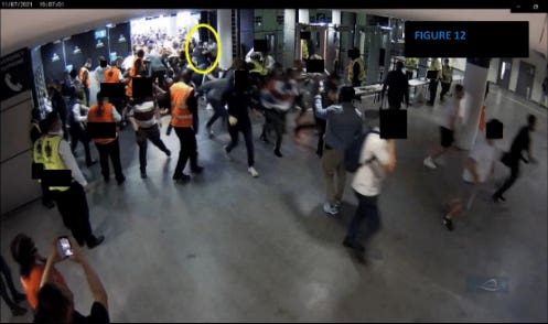 Supporters force open an emergency fire door to force entry to Wembley at the Euro 2020 final