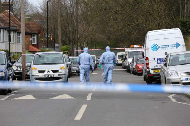 Forensic officers at work (Gareth Fuller/PA)