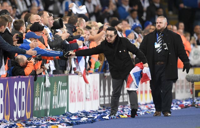 Vice chairman Aiyawatt Srivaddhanaprabha greets Leicester fans during a lap of the pitch following the draw with Burnley - the Foxes' first home game since the death of his father and chairman Vichai Srivaddhanaprabha