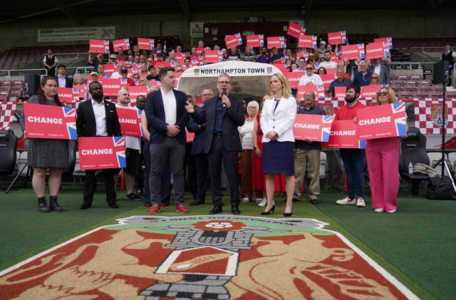 Sir Keir Starmer addresses a crowd at Northampton Town Football Club