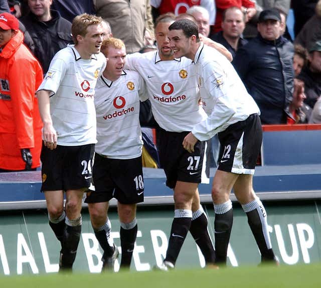 Paul Scholes, second left, handed Arsenal defeat (Rui Vieira/PA)