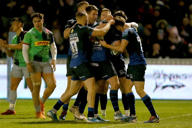 Sale Sharks celebrate during their 48-10 bonus-point win over Harlequins