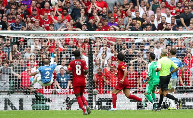 Kyle Walker makes an incredible clearance to deny Mohamed Salah in stoppage time before Manchester City beat Liverpool on penalties in the Community Shield 