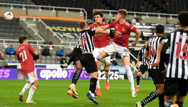 Harry Maguire, centre, equalised for Manchester United