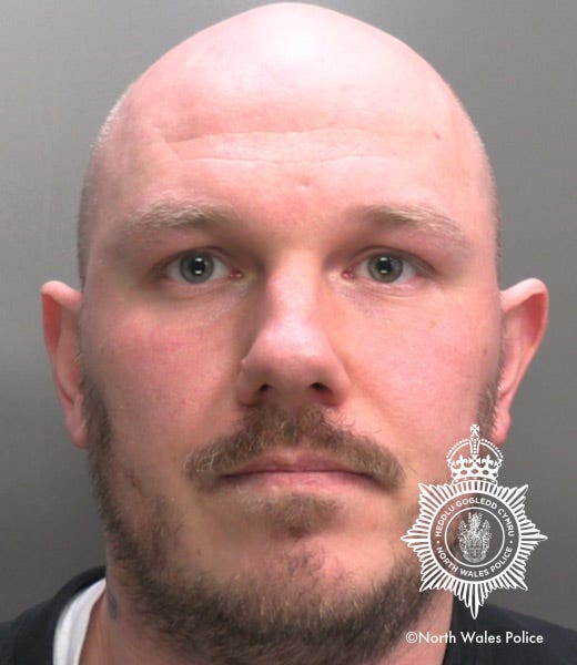 Mug shot of Miles Cross