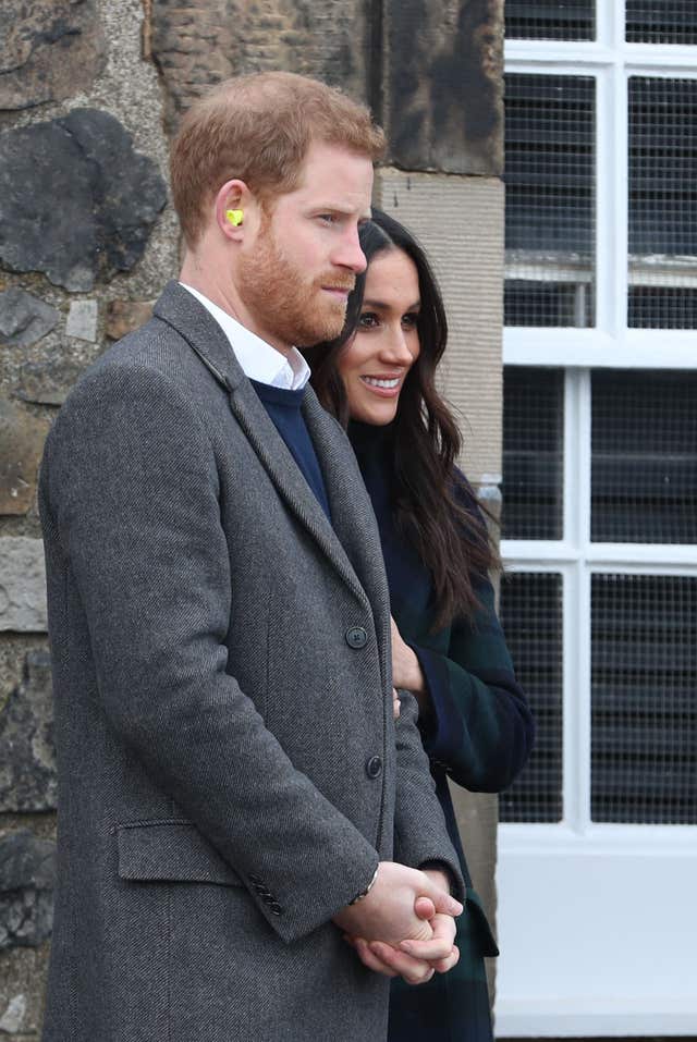 Prince Harry and Meghan Markle watching the firing of the One O’Clock Gun at Edinburgh Castle (Jane Barlow/PA)