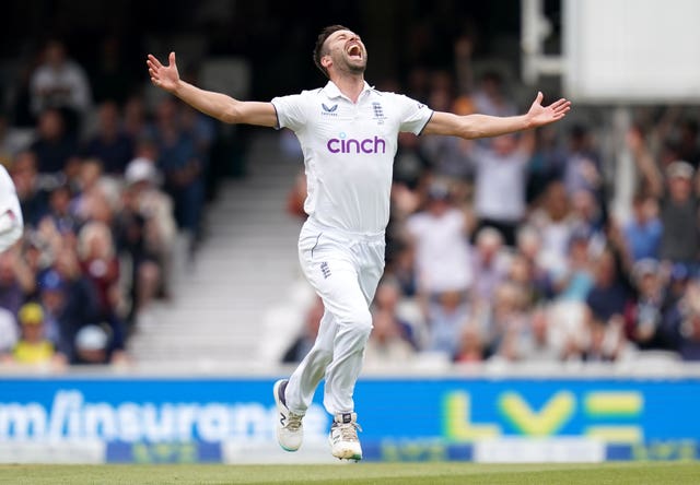 Mark Wood celebrates a wicket