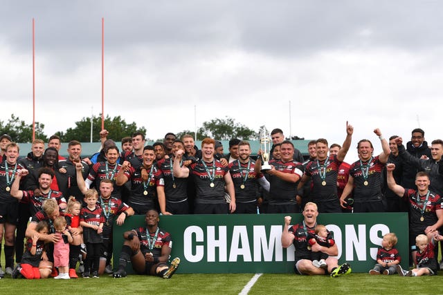 Saracens celebrate winning the Championship