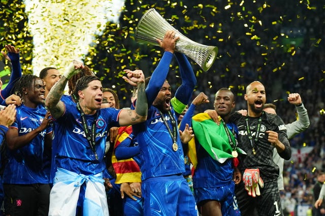 Reece James lifts the Conference League trophy