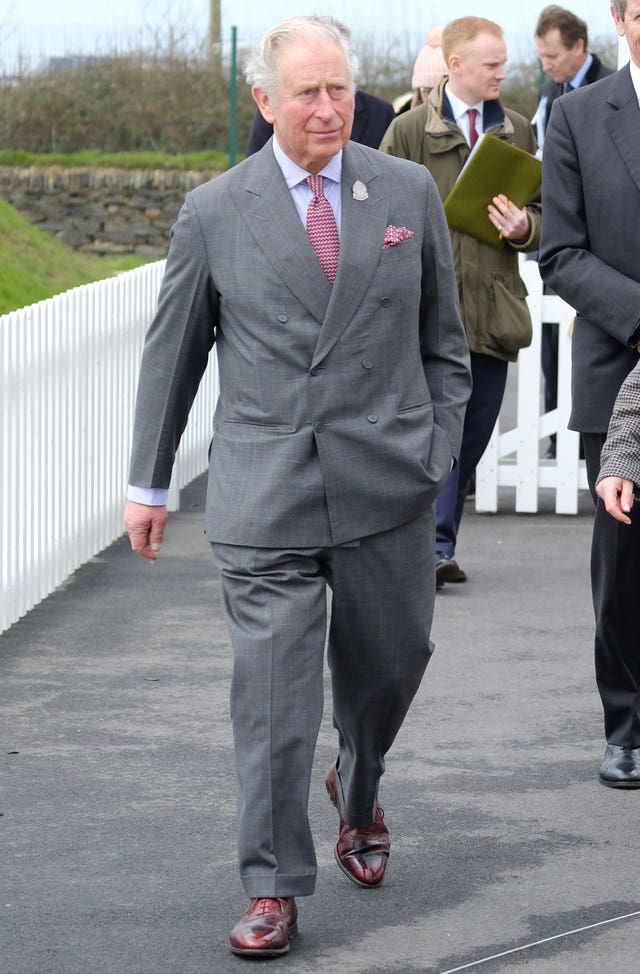 The prince is known for his love of double-breasted suits. Matt Keeble/PA Wire